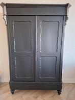 Zwarte brocante kast, Ophalen