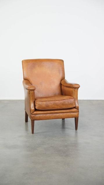 Comfortabele cognac-kleurige schapenleren armchair beschikbaar voor biedingen