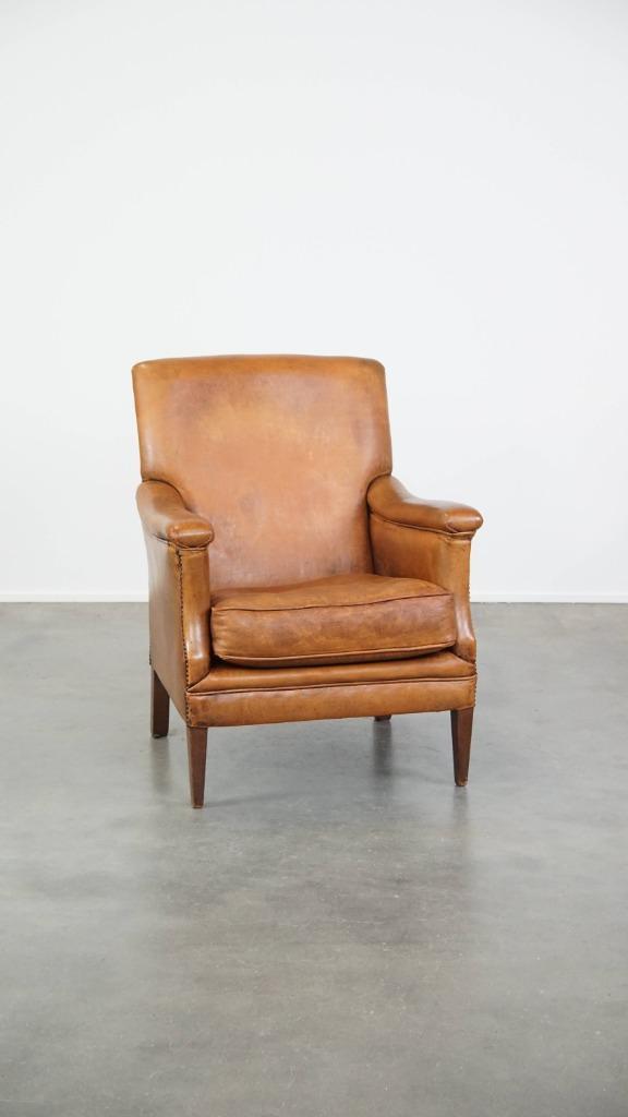 Comfortabele cognac-kleurige schapenleren armchair, Huis en Inrichting, Fauteuils, Gebruikt, Leer, 50 tot 75 cm, 75 tot 100 cm
