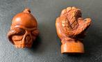 Ojimes in buxushout van slangen met hand en doodshoofd, Antiek en Kunst, Ophalen of Verzenden