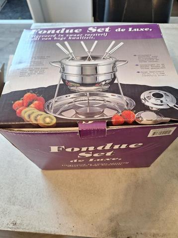 Fondue set de luxe beschikbaar voor biedingen