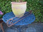 oude metalen ornament, Ophalen