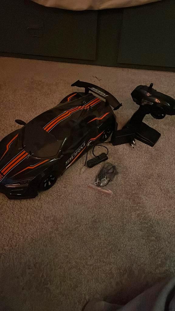 Storm messenger afstands bestuurbare auto, Hobby en Vrije tijd, Modelbouw | Radiografisch | Auto's, Zo goed als nieuw, Auto onroad