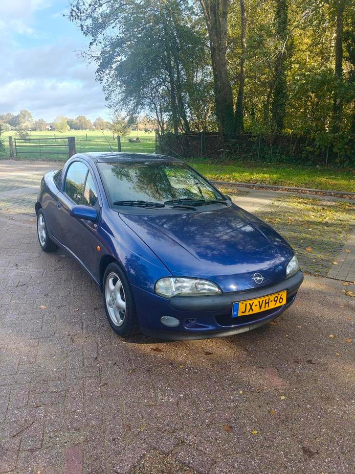 Opel Tigra 1.4 I 16V 1995 Blauw, Auto's, Opel, Particulier, Tigra, Centrale vergrendeling, Elektrische ramen, Lichtmetalen velgen