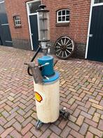 Benzinepomp shell, Ophalen