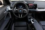 BMW iX1 xDrive30 High Executive M Sport 66 kWh / Panoramadak, Auto's, BMW, Te koop, Zilver of Grijs, Gebruikt, 750 kg