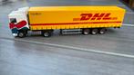 HERPA DAf TRUCK MET DHL OPLEGGER, Ophalen of Verzenden, Zo goed als nieuw