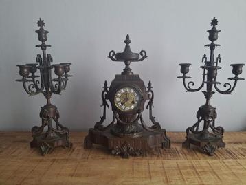 antieke klok met 2 kandelaars beschikbaar voor biedingen