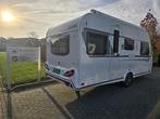 Knaus Sudwind 60 Years 460 EU met luifel, mover en lengtebed, Caravans en Kamperen, Caravans, Schokbreker, Bedrijf, Treinzit, 5 tot 6 meter