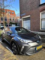 Toyota C-HR 1.8 Hybrid Team D/Camera/Cruise /Climate/Keyless, Auto's, Toyota, 725 kg, Euro 6, 4 cilinders, Leder en Stof