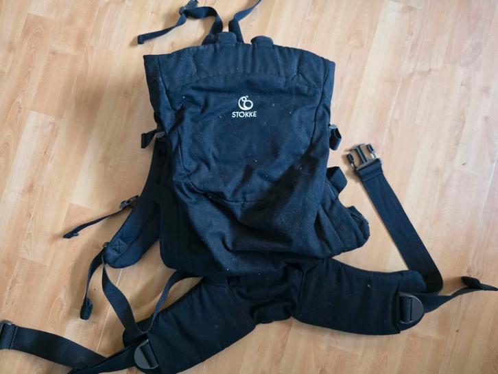 Zo goed als nieuwe zwarte Stokke draagzak buik en rug, Kinderen en Baby's, Babydragers en Draagdoeken, Zo goed als nieuw, Draagzak