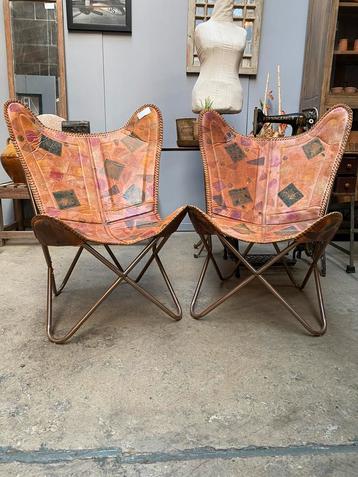 Vintage leren vlinder stoel met fraaie print beschikbaar voor biedingen