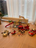 Playmobil brandweerauto, helikopter en waterspeeltuin, Hobby en Vrije tijd, Modelauto's | 1:32, Ophalen of Verzenden, Zo goed als nieuw
