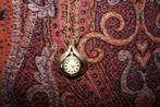 Horloge hangend aan een ketting, Antiek en Kunst, Ophalen of Verzenden