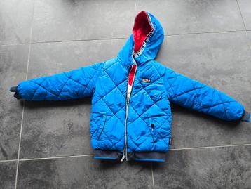 Heerlijke warme winterjas maat 122/128. Reversibel beschikbaar voor biedingen