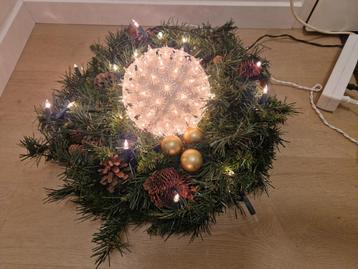 kerstkrans met verlichtingsbal beschikbaar voor biedingen