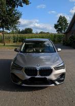 BMW X1 xDrive25e SportLine | Hybride | Automaat | Navigation, Auto's, BMW, 4 cilinders, Leder, Vierwielaandrijving, Dealer onderhouden