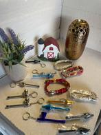 Te koop partij 850 st rasta armbandjes en pijpjes, Ophalen of Verzenden