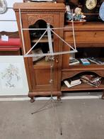 Muziekstandaard metaal, Ophalen