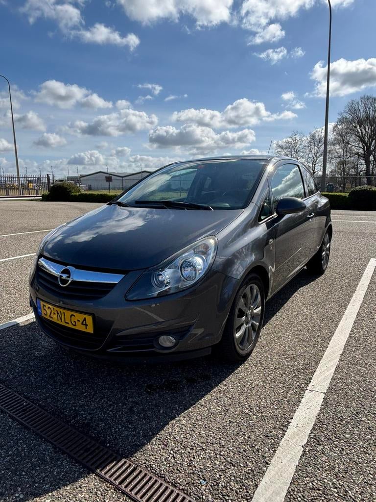 Opel Corsa 1.2 16V 3D Easytronic 2010 Grijs, Auto's, Opel, 450 kg, 40 €/maand, 750 kg, 1229 cc