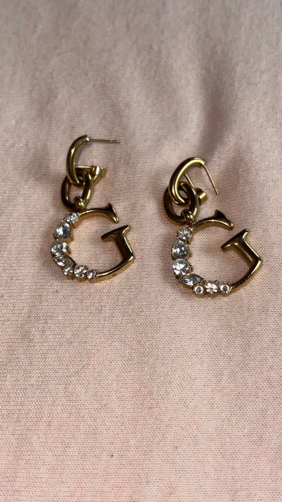 Guess oorbellen, Overige materialen, Hangers, Ophalen of Verzenden, Zo goed als nieuw