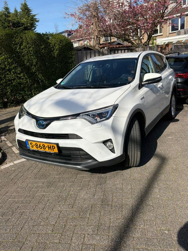 Toyota RAV4 2.5 Hybrid AWD / 197pk / +1000km bereik / TEAM D, Auto's, Toyota, Automaat, Wit, USB, Vierwielaandrijving