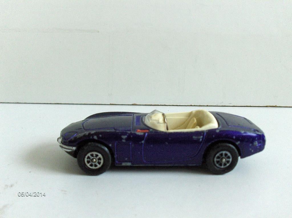 A Corgi Toys Whizzwheels No. 201 Volvo P1800 The Saint's car, within a