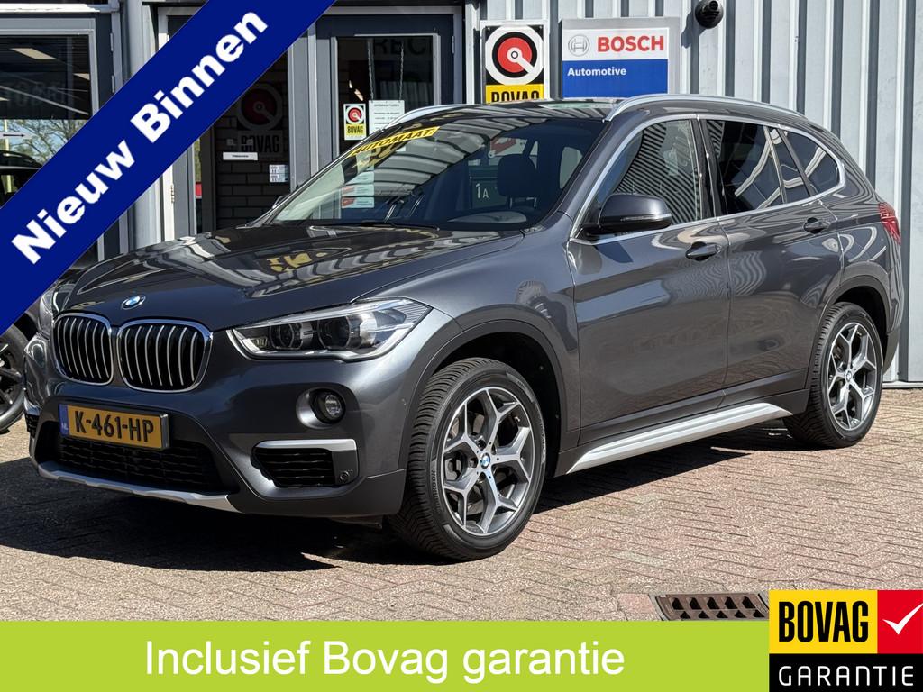 BMW X1 sDrive18i High Executive | AUTOMAAT | TREKHAAK | NAVI, Auto's, BMW, Lichtsensor, Gebruikt, Leder en Stof, 19 km/l
