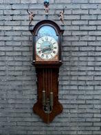 Friese klok, Ophalen