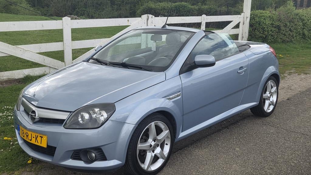 Opel Tigra 1.8 16V Twintop 2005 Blauw, Auto's, Opel, 125 pk, Zwart, 4 cilinders, Blauw
