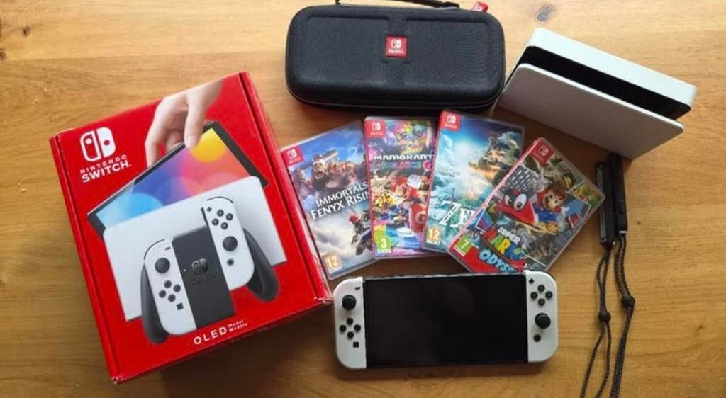 Nintendo Switch OLED (met games), Switch OLED, Met games, Verzenden, Zo goed als nieuw