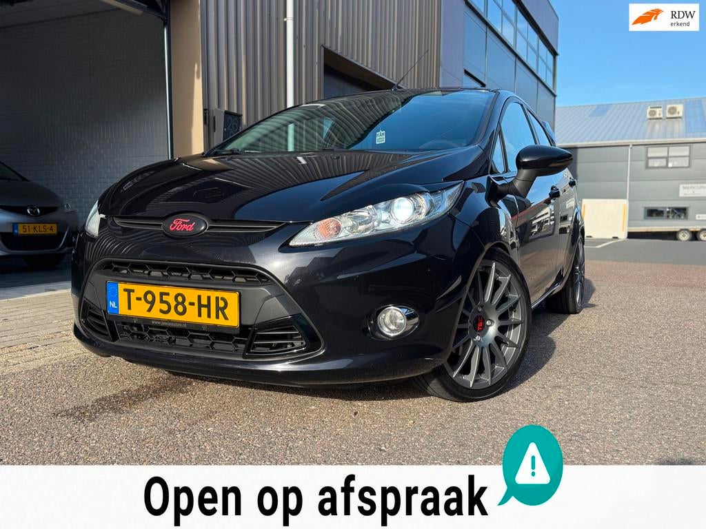 Ford Fiesta 1.25 Ghia UITLAATKLEP LED STOEL VERWARMING, Auto's, Voorwielaandrijving, Euro 5, Met garantie (alle), 82 pk