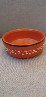 Oranje aardewerk schaaltje met stippen en zwarte rand, Ophalen of Verzenden