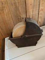 Oude handmatige slijpsteen, Ophalen