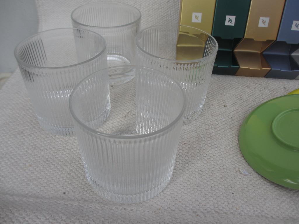 Design NESPRESSO 4 stuks Barista glazen /Schoteltjes, Ophalen of Verzenden, Zo goed als nieuw, Meerkleurig, Overige merken