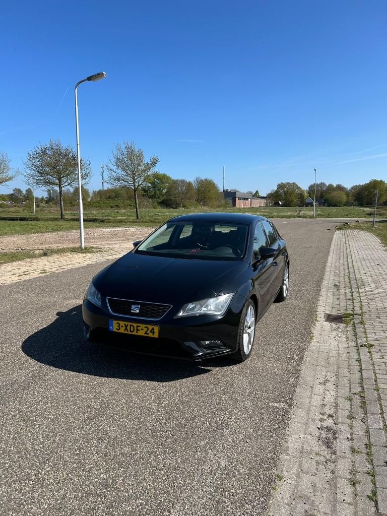 Seat Leon 1.2 TSI 77KW/105PK 2013 Zwart, Auto's, Voorwielaandrijving, Zwart, 4 cilinders, Leon