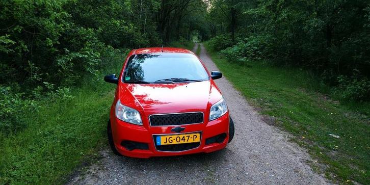 Chevrolet Aveo 1.2 16V 3D 2009 Rood, Auto's, Chevrolet, Particulier, Aveo, ABS, Airbags, Electronic Stability Program (ESP), Elektrische ramen
