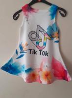 Tik tok jurkje te koop 110, Nieuw, Meisje, Ophalen of Verzenden, Jurk of Rok