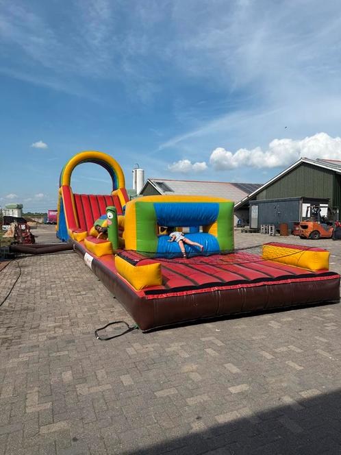Stormbaan 22 meter - Springkussen tehuur, Kinderen en Baby's, Speelgoed | Buiten | Springkussens, Gebruikt, Ophalen of Verzenden