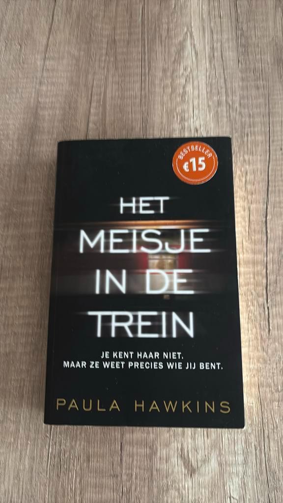 Paula Hawkins - Het meisje in de trein, Boeken, Thrillers, Zo goed als nieuw, Nederland, Ophalen of Verzenden