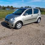 Daihatsu Sirion 1.3  2009  *Zeer mooi * 83467 km Org Ned, Auto's, Voorwielaandrijving, Stof, Zwart, 4 cilinders