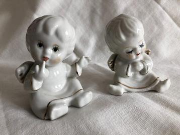 Vintage witte engeltjes beschikbaar voor biedingen