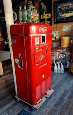 Coca Cola Vendo VMC 33 automaat, Ophalen