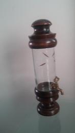 Fraai bewerkte kraantjesfles in eikenhouten frame., Antiek en Kunst, Antiek | Woonaccessoires, Ophalen of Verzenden