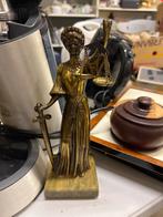 Bronzen Justitia Beeld, Ophalen
