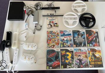Nintendo Wii met 4 Controllers, 9 Games waaronder Mario Kart beschikbaar voor biedingen