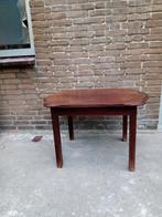salontafel met mooi gevormd blad, Ophalen