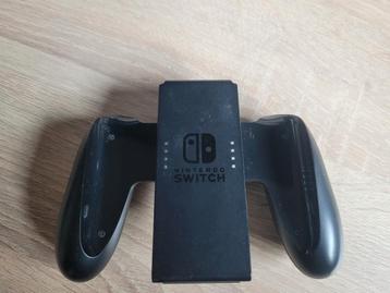 Nintendoswitch joycon charger grip.  beschikbaar voor biedingen