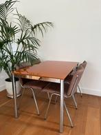 Uitschuif eettafel Calligaris met leren stoelen, Huis en Inrichting, Complete eetkamers, Ophalen, Zo goed als nieuw