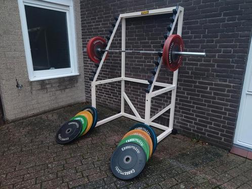 Technogym squat rack+ halterstang + 150 kg bumperplates cros, Sport en Fitness, Fitnessmaterialen, Zo goed als nieuw, Halterset